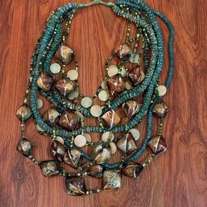 Gorgeous turquoise multi strand statement beaded necklace with shells
